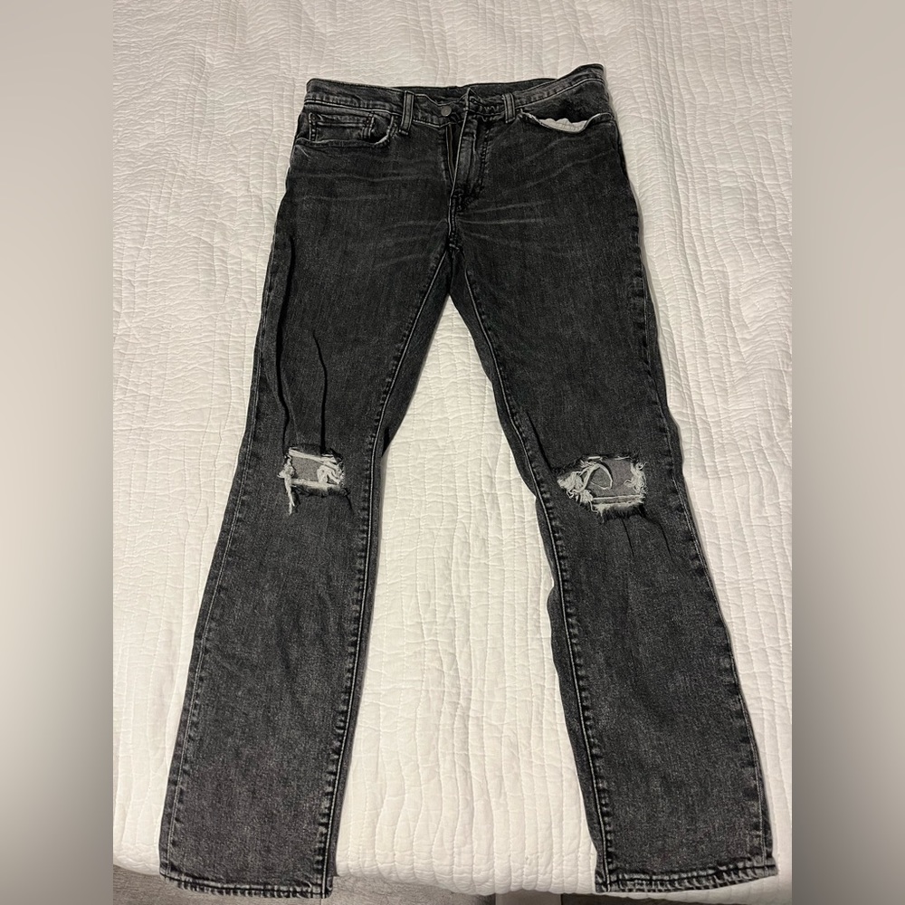 Levi’s black ripped jeans